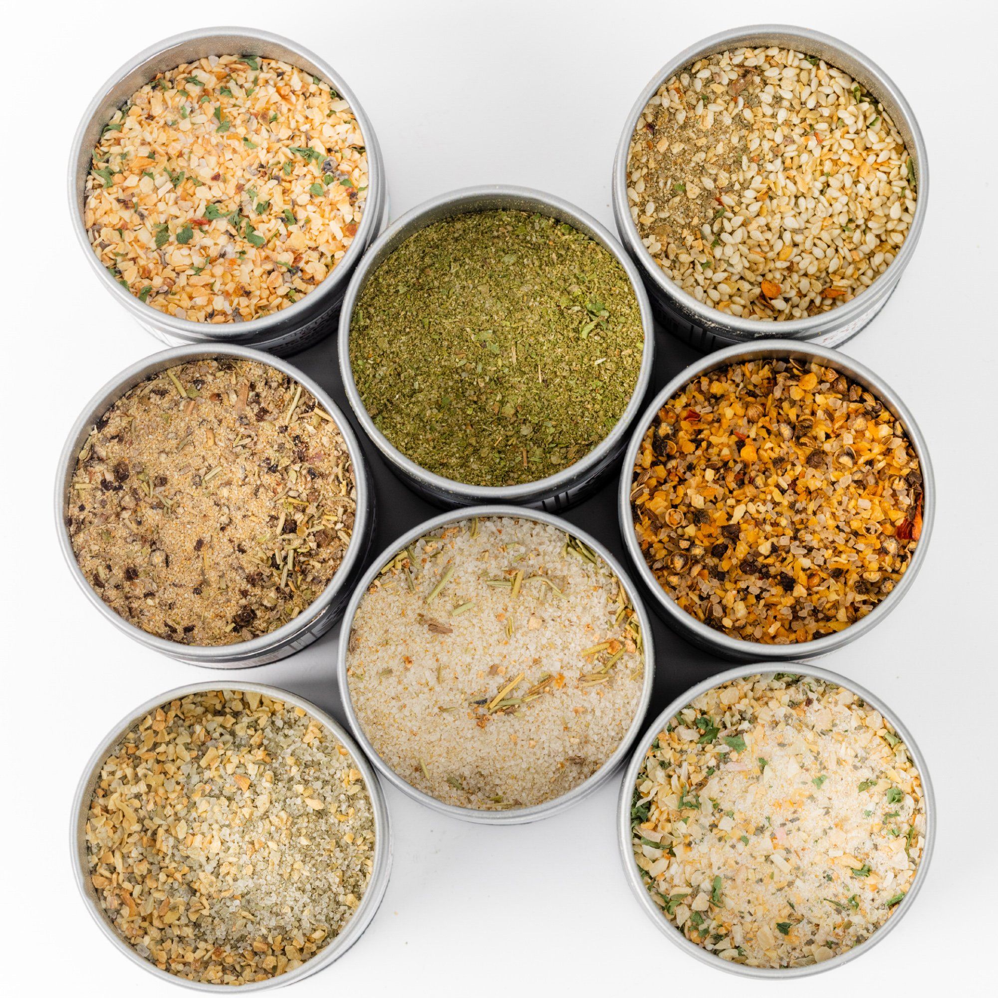 https://www.gustusvitae.com/cdn/shop/products/deluxe-home-chef-flavor-kit-8-gourmet-seasonings-salts-in-a-handsome-gift-tin-collections-gift-sets-gustus-vitae-354763_1024x1024@2x.jpg?v=1623388794